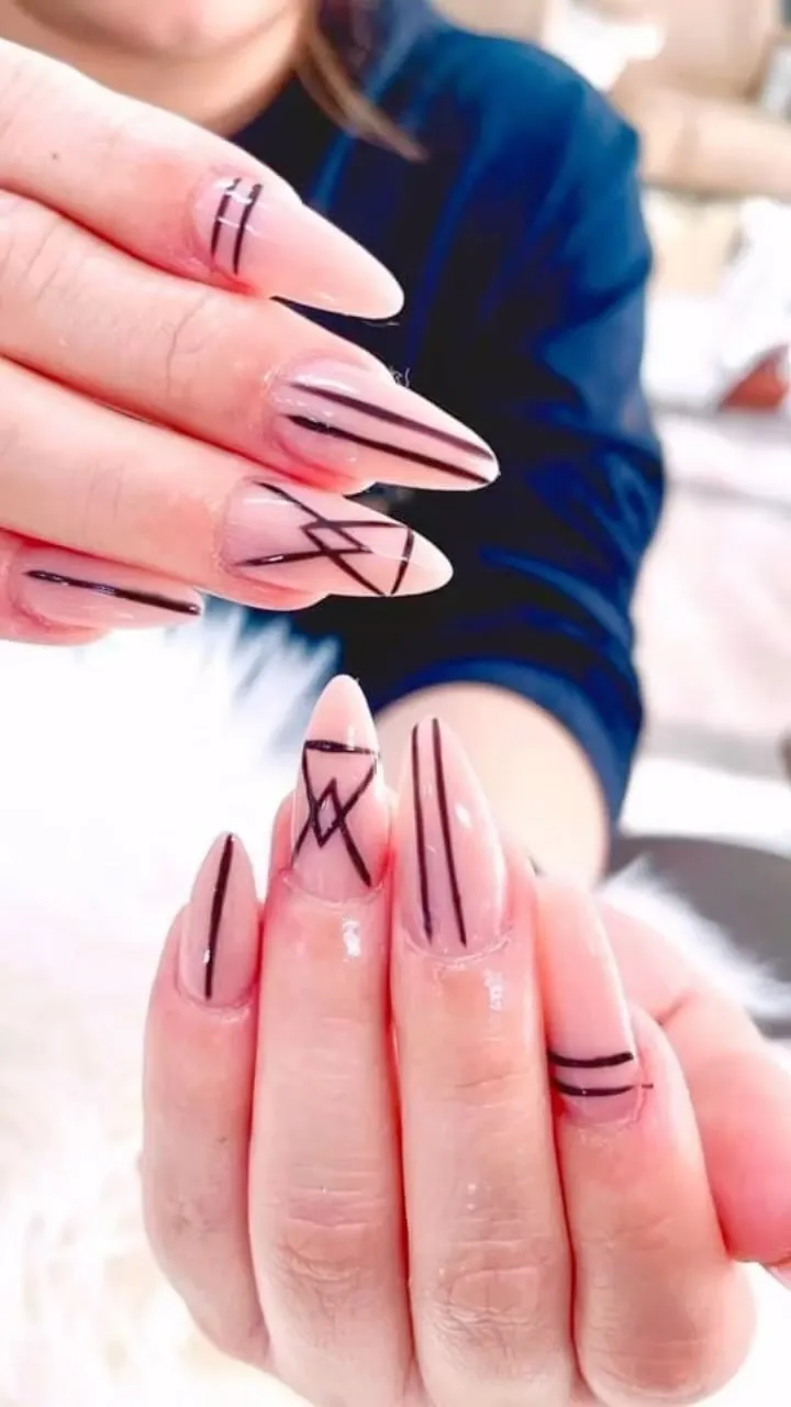 Nail design by TJ Nails & Spa, April 2024