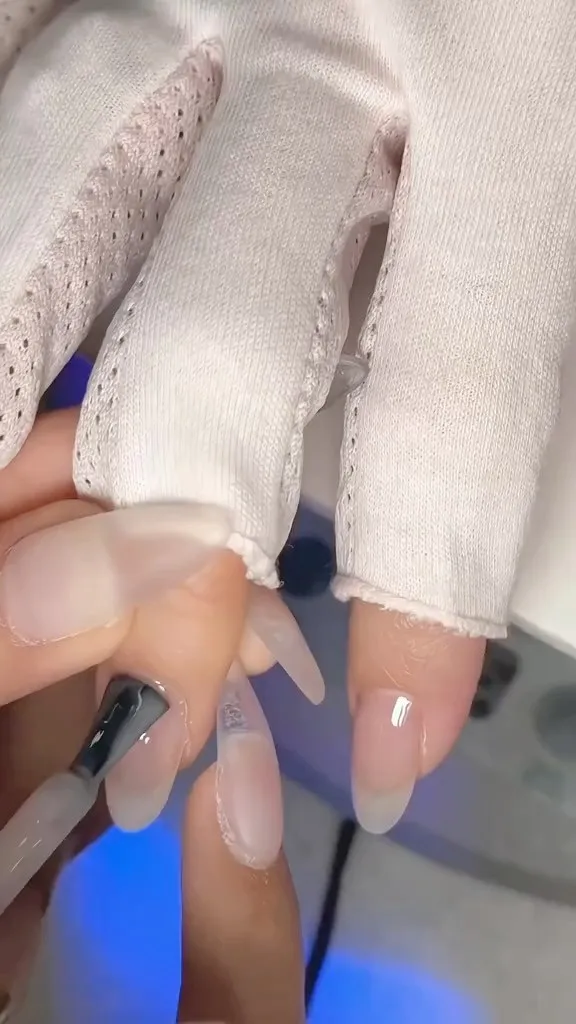 Nail design by TJ Nails & Spa, July 2023
