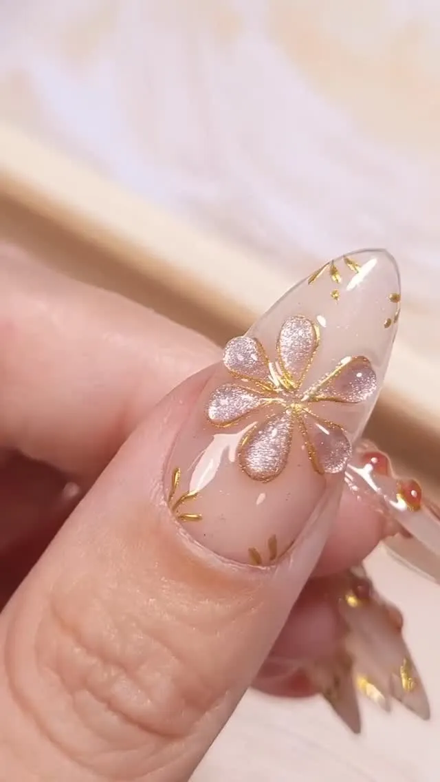 Nail design by TJ Nails & Spa, April 2025