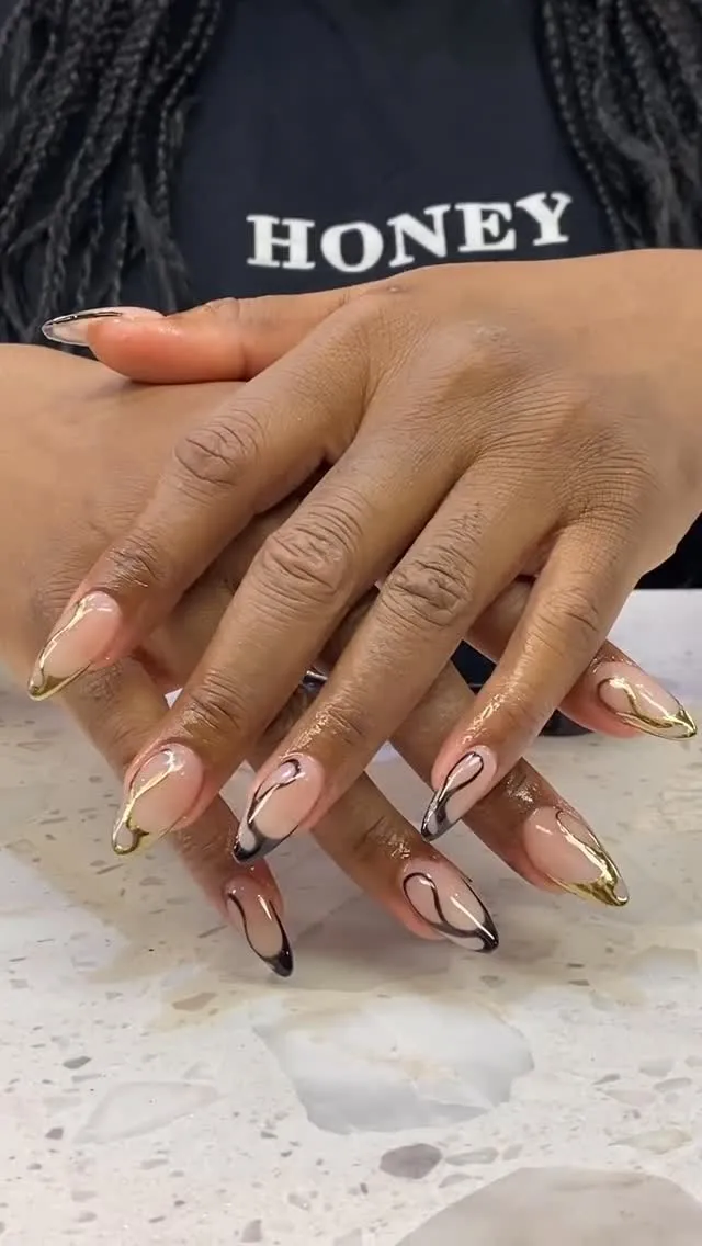 Nail design by TJ Nails & Spa, April 2025