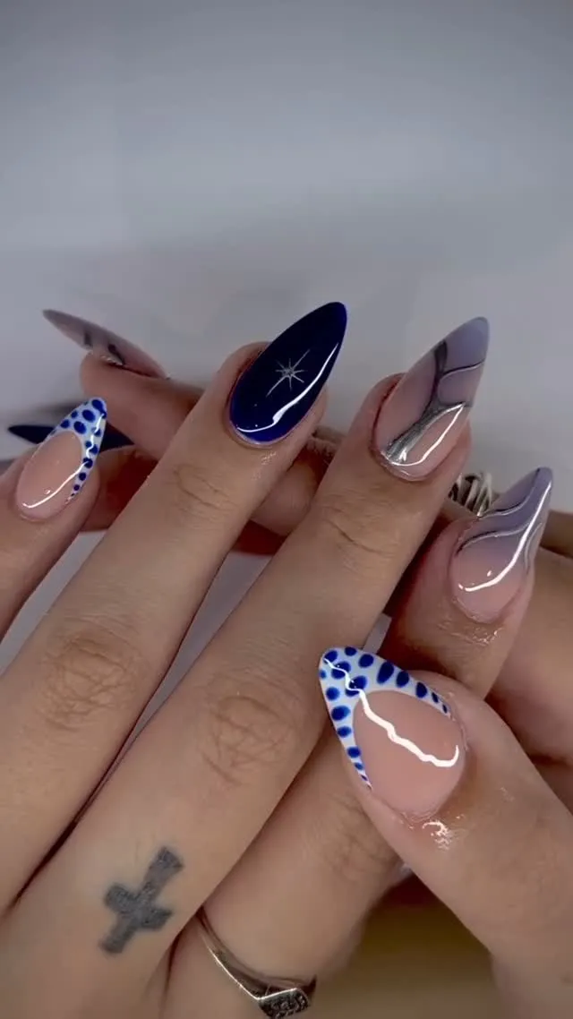 Nail design by TJ Nails & Spa, April 2025