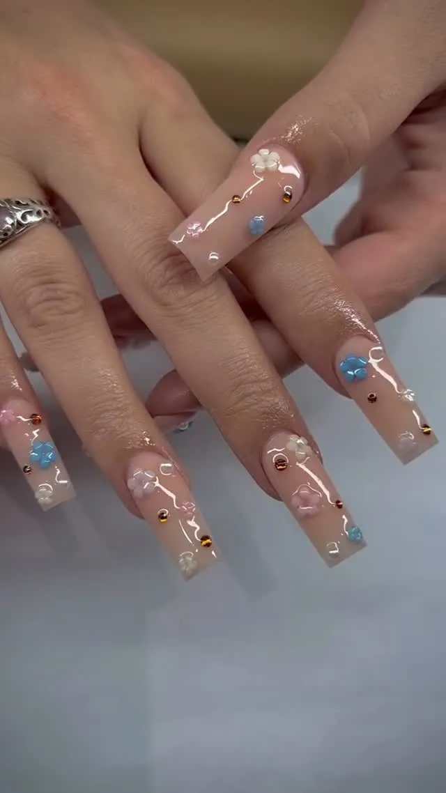 Nail design by TJ Nails & Spa, May 2025
